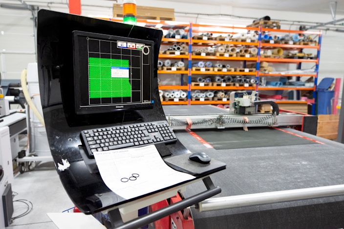 Digital Platforms dashboard showing industrial CNC laser cutter monitor panels and high performance controls